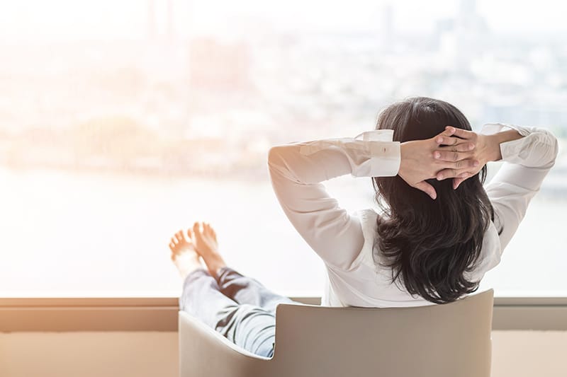 woman relaxing in a chair