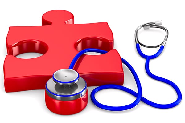 puzzle piece with a stethoscope