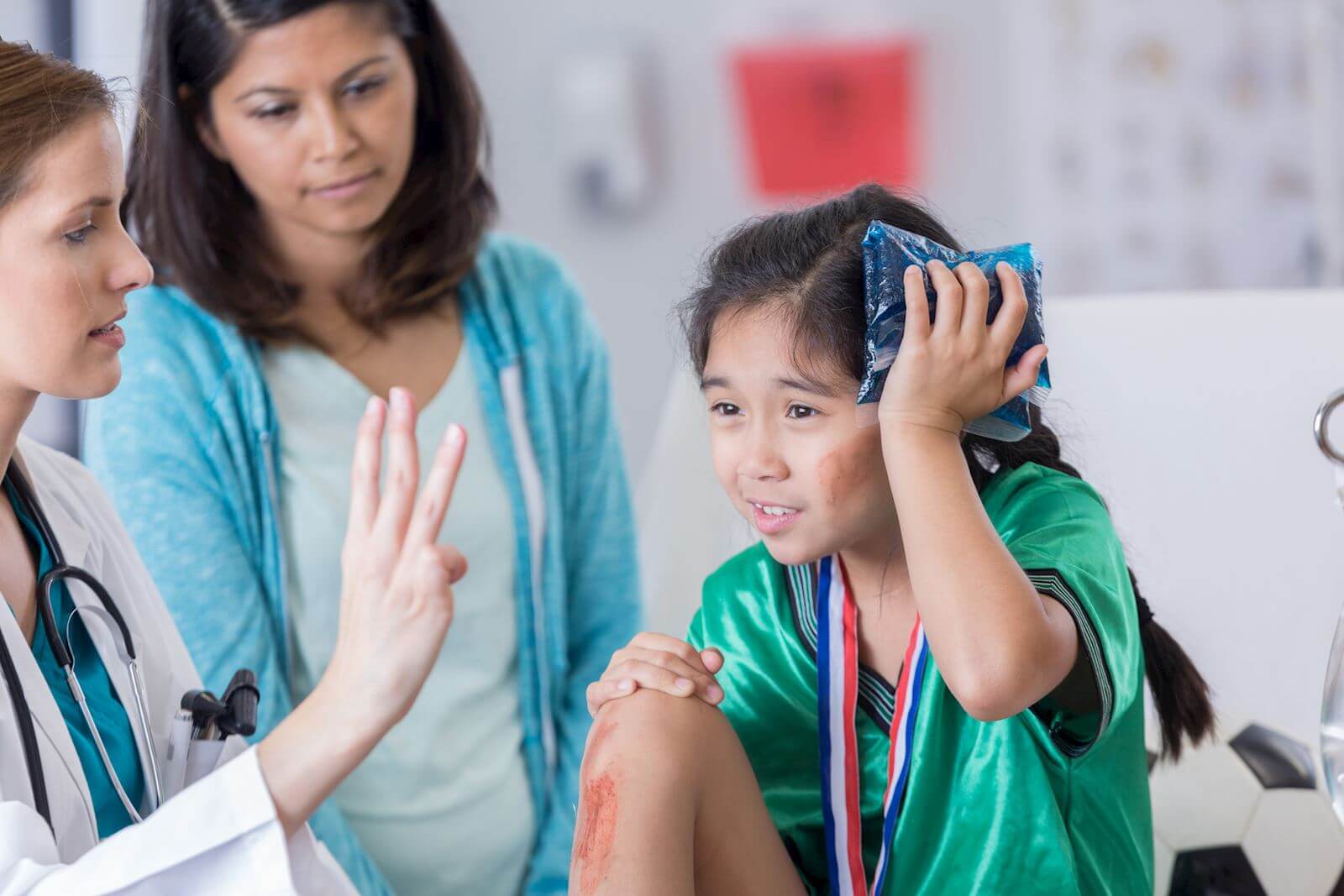 young girl with an ice pack