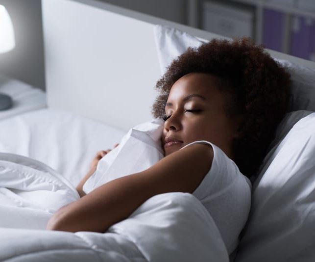 woman sleeping in bed