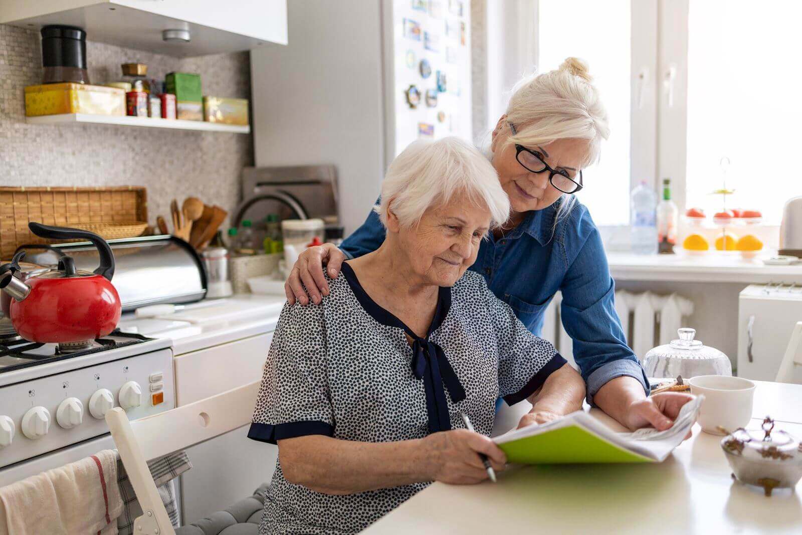 adult woman caring for her older mother