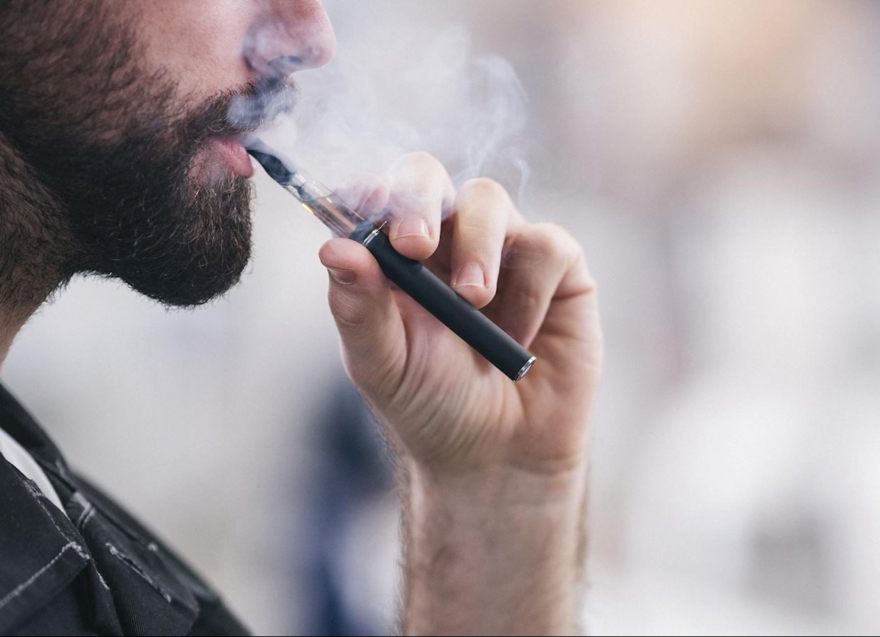 man vaping