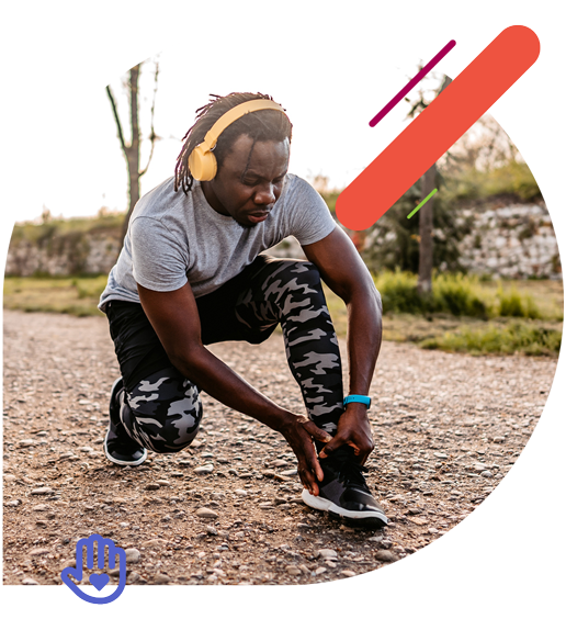 Man checking his ankle during a run