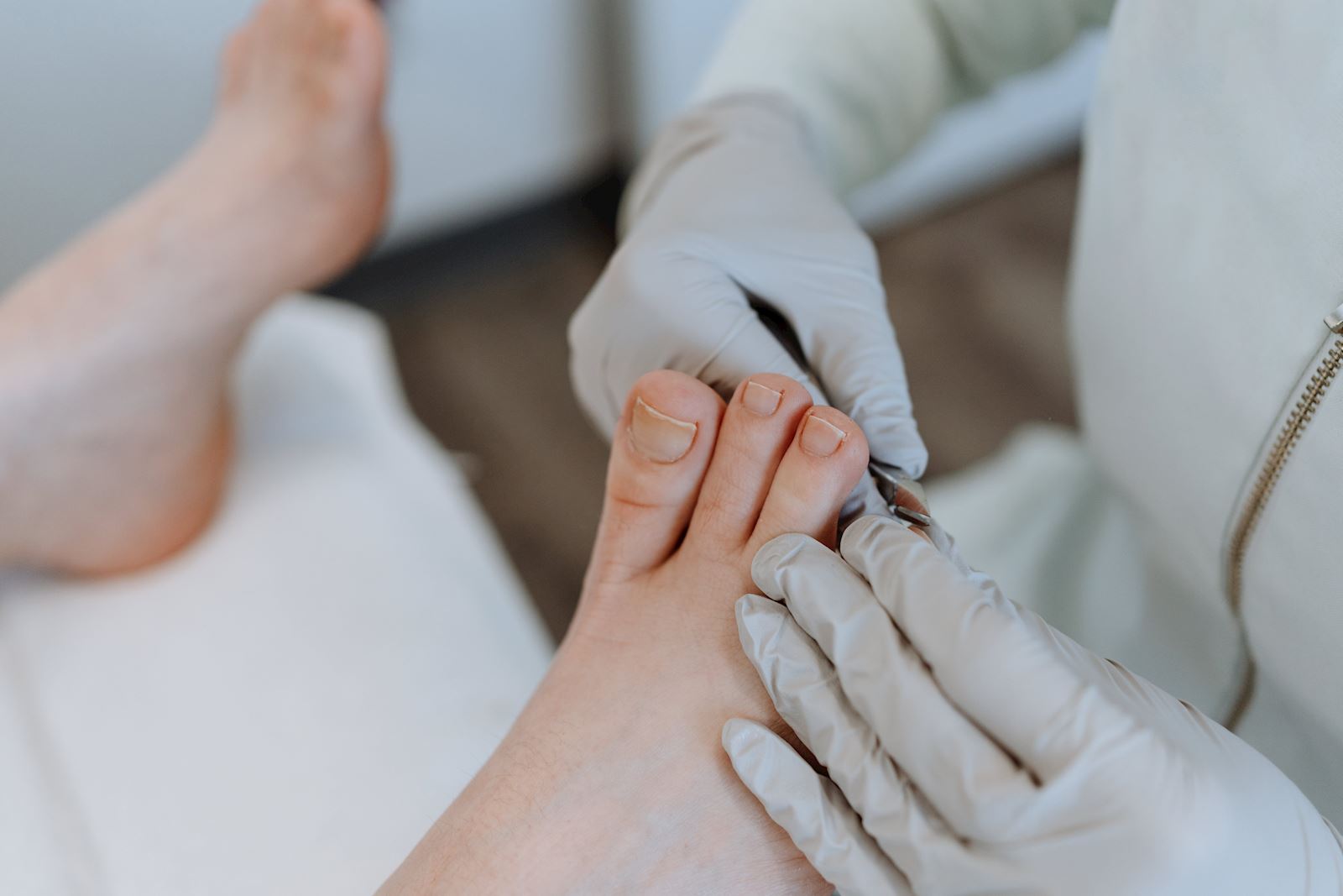 doctor examining toes