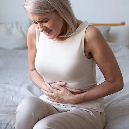 woman with hurting small intestine