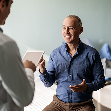man talking with doctor
