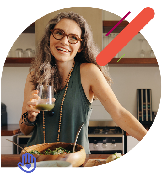 woman enjoying beverage in kitchen