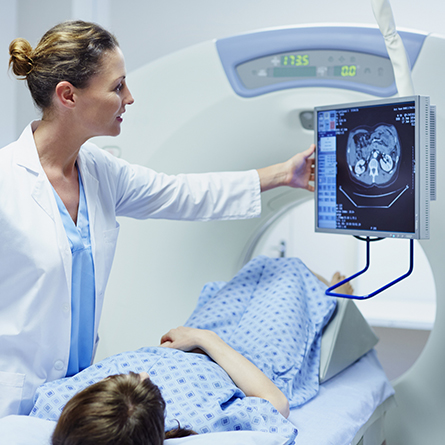 doctor checks out patient's scans