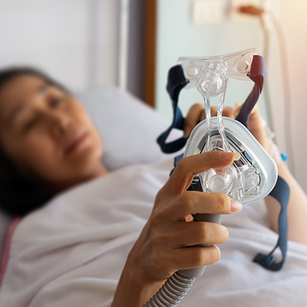 person with sleep apnea mask