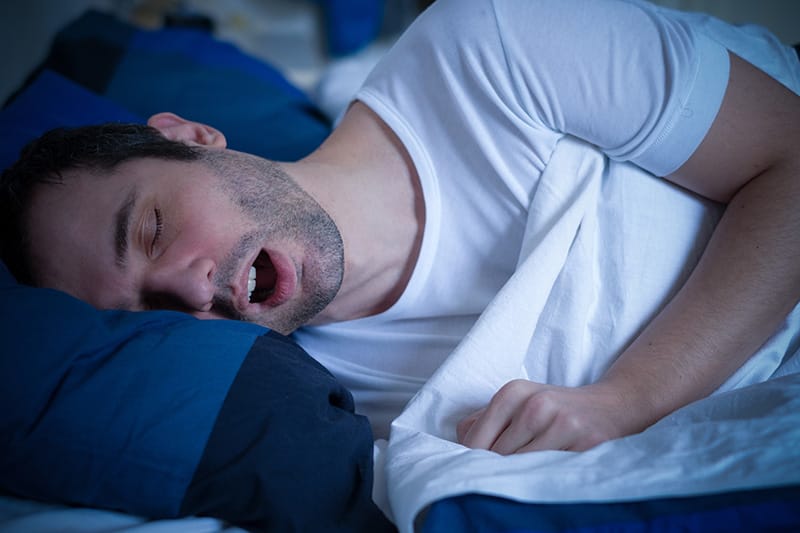 Man sleeping with his mouth open